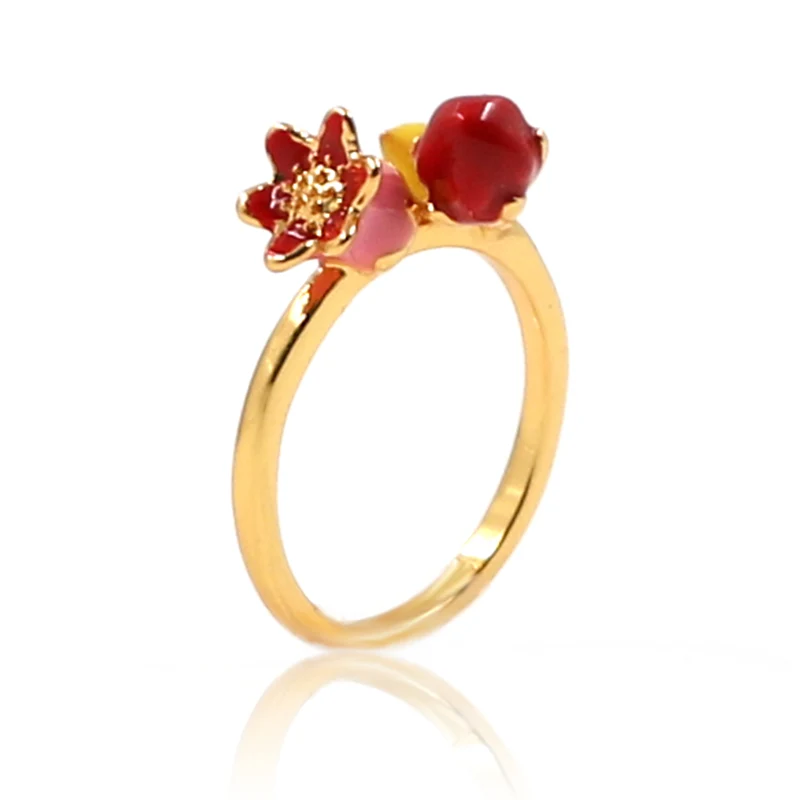 Electrum flos in rubeum rosea color aes anulum cum auro patella