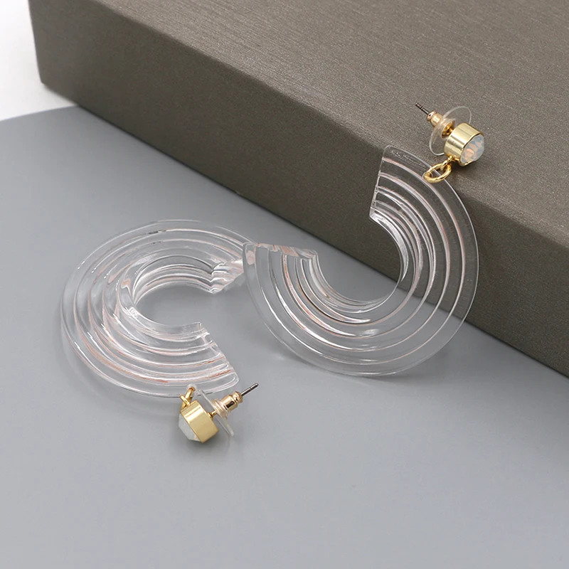 Transparent C figura acrylic cum moonstone inaures
